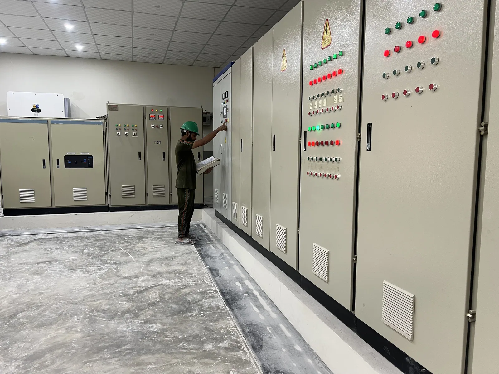 Operator working with control equipment at Asian Carbonate
