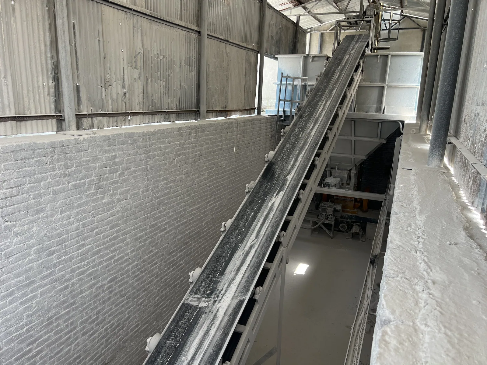 Material handling conveyor at Asian Carbonate production facility